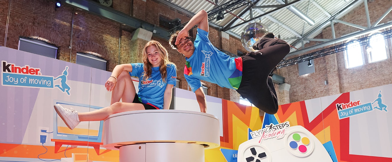 a girl and a boy during a Kinder Joy of moving event